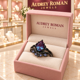 Alice Purple Layered Ring (black finish) in a rose Audrey Roman Jewels box inside the boutique.