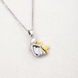 Selina Girl Hugging a Dog Necklace — Gold-Tone — image 1