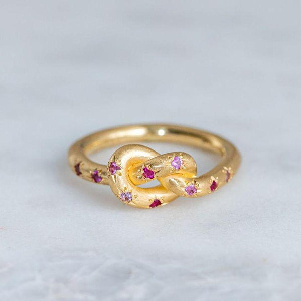 Anastasia Retro Pink Ring with Gold-Tone Celestial Knot