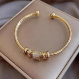 Gloria Adjustable Gold-Tone Charm Bracelet