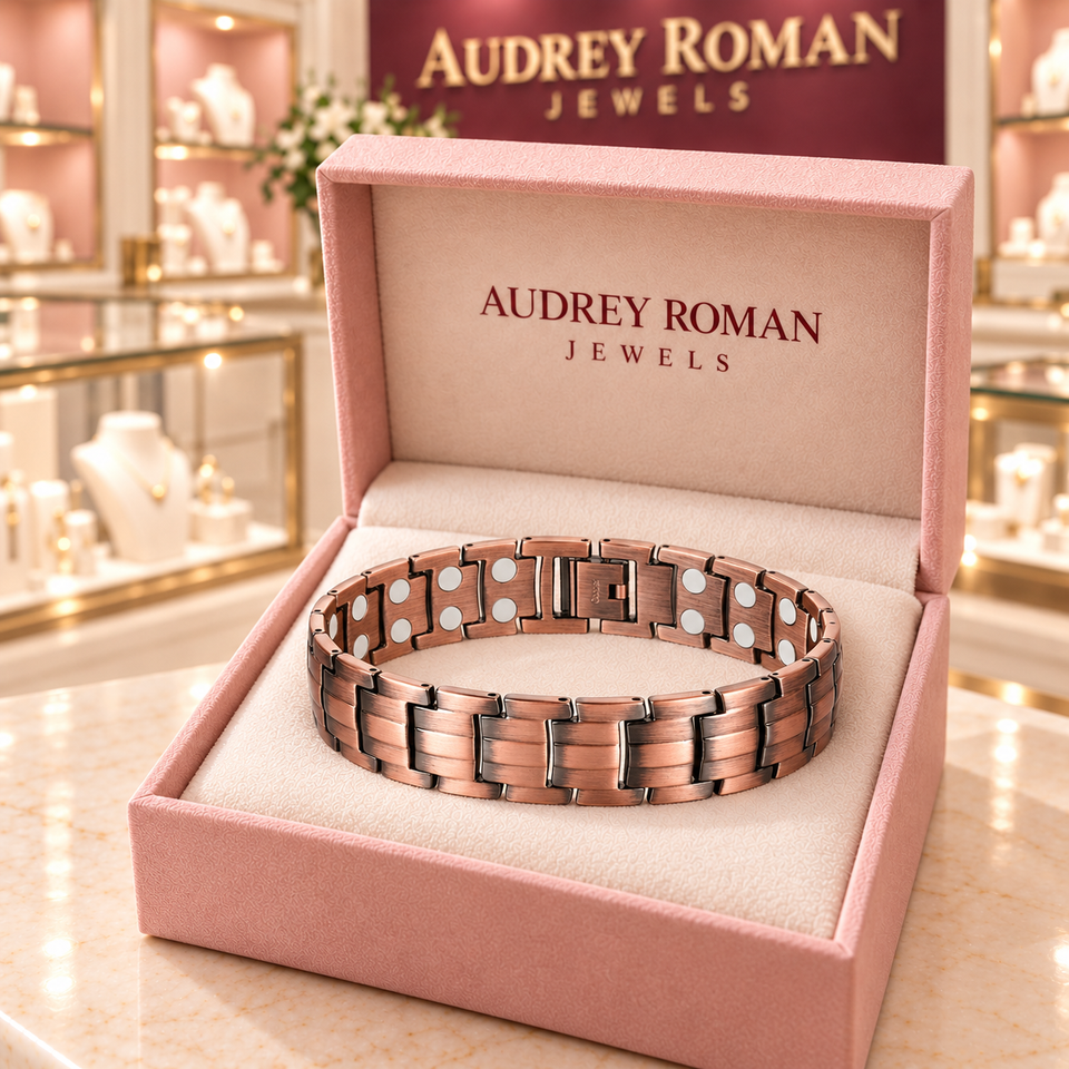 Clara Chain Bracelet in copper tone inside a rose Audrey Roman Jewels presentation box on the boutique counter.