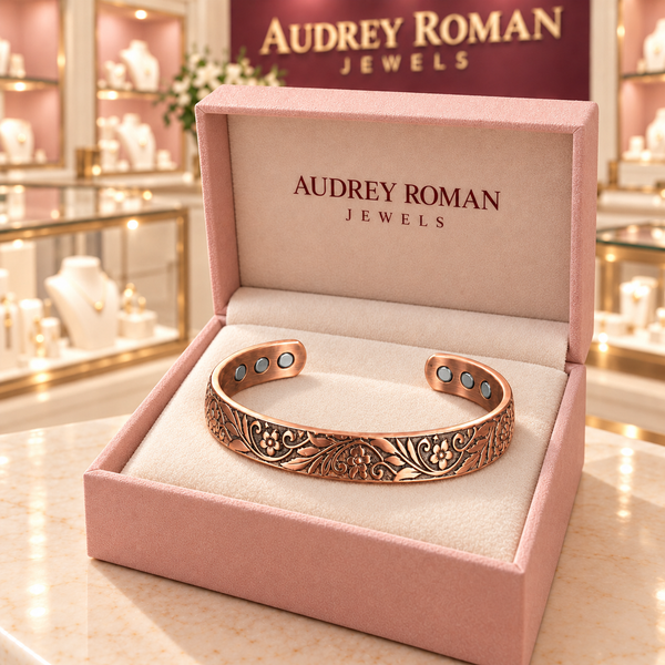 Florence Vine Bracelet in copper tone inside a rose Audrey Roman Jewels presentation box on the boutique counter.