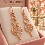 Eleanor Swirl Earrings in a close detail view inside the boutique.